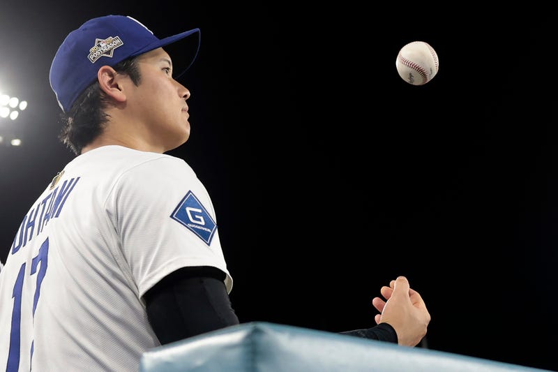 Shohei Ohtani #17 of the Los Angeles Dodgers looks on during the eighth inning of game two of National League Wild Card Series against the Cincinnati Reds at Dodger Stadium on October 01, 2025 in Los Angeles, California. 