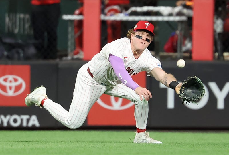 Harrison Bader #2 of the Philadelphia Phillies dives to make a catch in centerfield in the fifth inning against the Los Angeles Dodgers