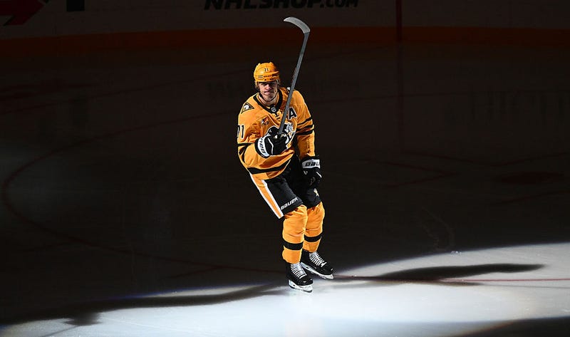 Evgeni Malkin honored with spotlight on ice