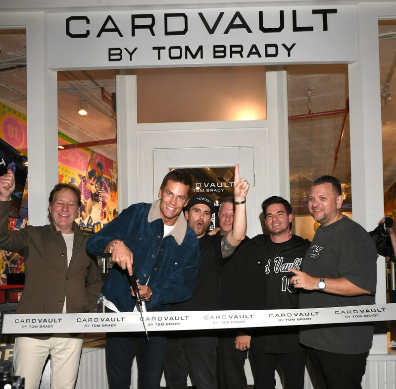 Tom Brady is seen cutting the ribbon at the opening of the CardVault by Tom Brady store in SoHo on Oct. 7, 2025