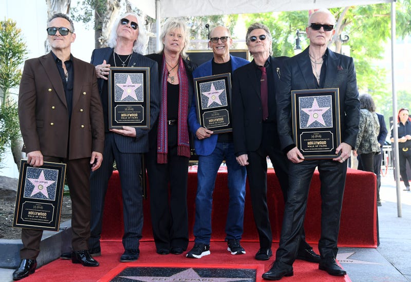 Vivian Campbell, Joe Elliott, Rick Savage, Bruce Resnikoff, Rick Allen and Phil Collen attend Def Leppard Honored With Star On Hollywood Walk Of Fame on October 09, 2025 in Hollywood, California.