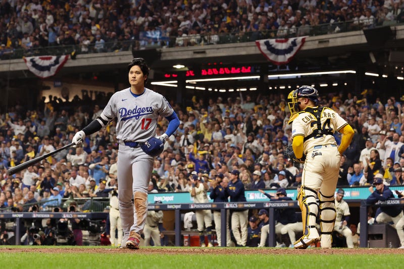 Shohei Ohtani #17 of the Los Angeles Dodgers walks back to the dugout after striking out during the eighth inning against the Milwaukee Brewers in game two of the National League Championship Series at American Family Field on October 14, 2025 in Milwaukee, Wisconsin.