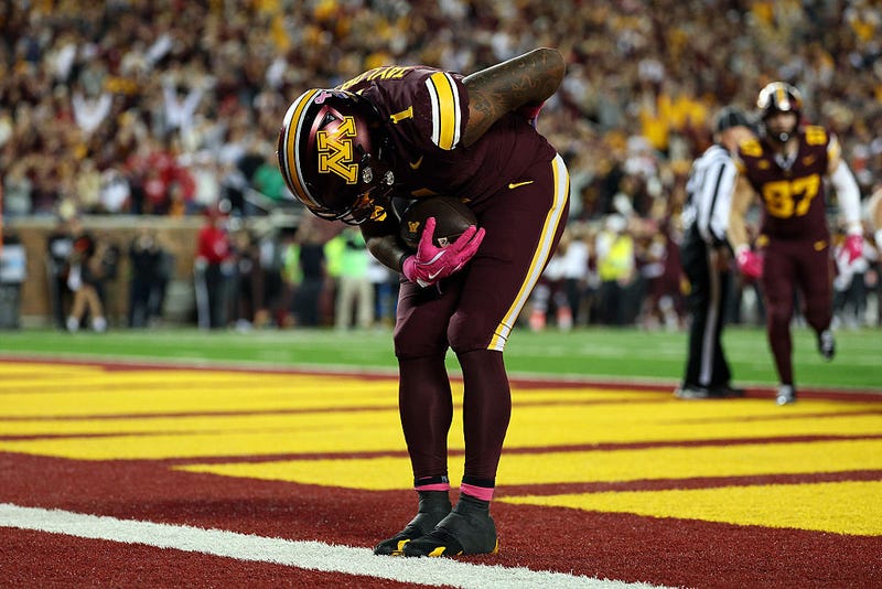 Darius Taylor #1 of the Minnesota Golden Gophers celebrates his touchdown against the Nebraska Cornhuskers in the fourth quarter at Huntington Bank Stadium on October 17, 2025 in Minneapolis, Minnesota. The Golden Gophers defeated the Cornhuskers 24-6. 
