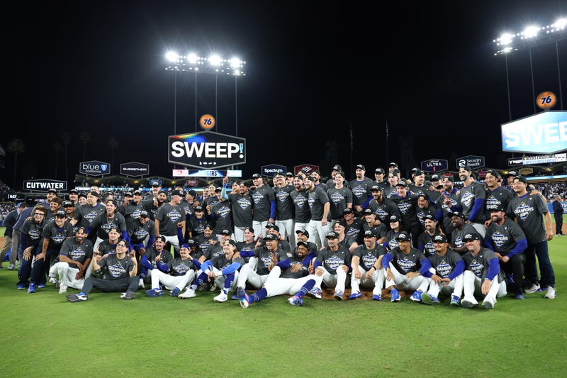 The Los Angeles Dodgers pose for a photo after defeating the Milwaukee Brewers 5-1 to in game four of the National League Championship Series at Dodger Stadium on October 17, 2025 in Los Angeles, California.