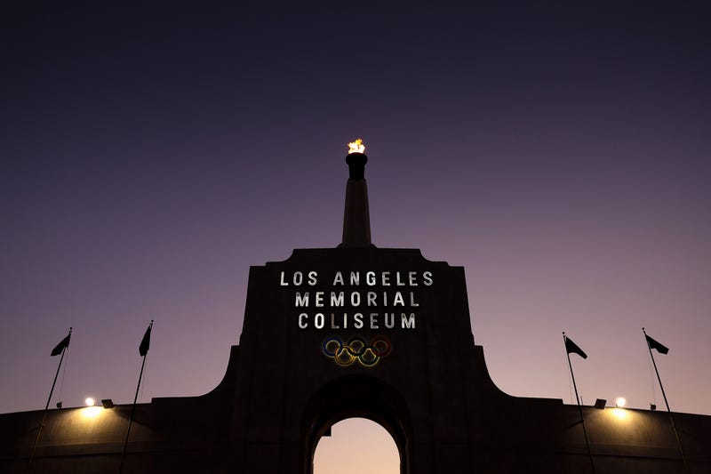 A general view of a flame atop a lit Olympic torch at the peristyle of the Los Angeles Memorial Coliseum on August 30, 2025 in Los Angeles, California.