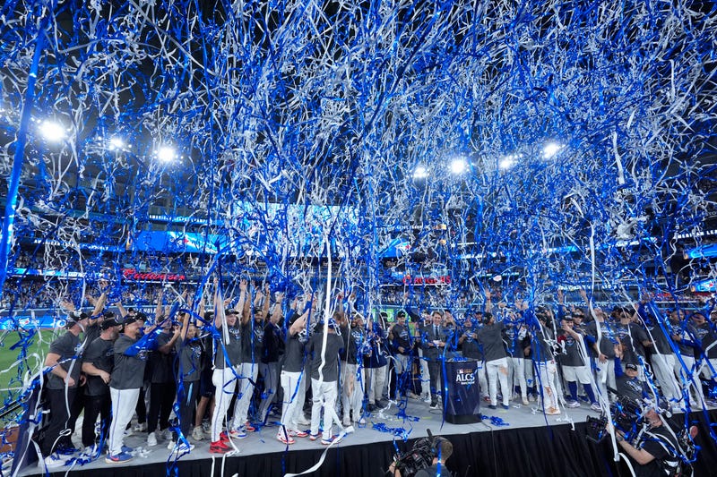 The Toronto Blue Jays celebrate after winning game seven of the American League Championship Series against the Seattle Mariners at the Rogers Centre on October 20, 2025 in Toronto, Ontario.