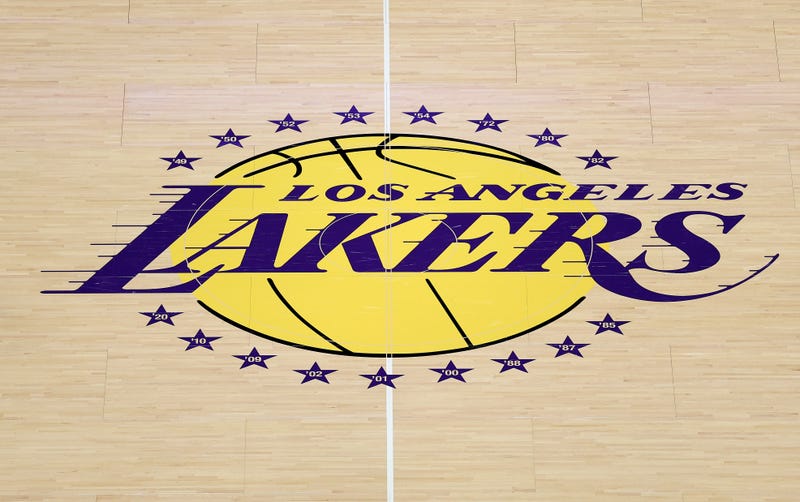 A detailed view of a Los Angeles Lakers logo on the court before the game against the Golden State Warriors at Crypto.com Arena on October 21, 2025 in Los Angeles, California. 