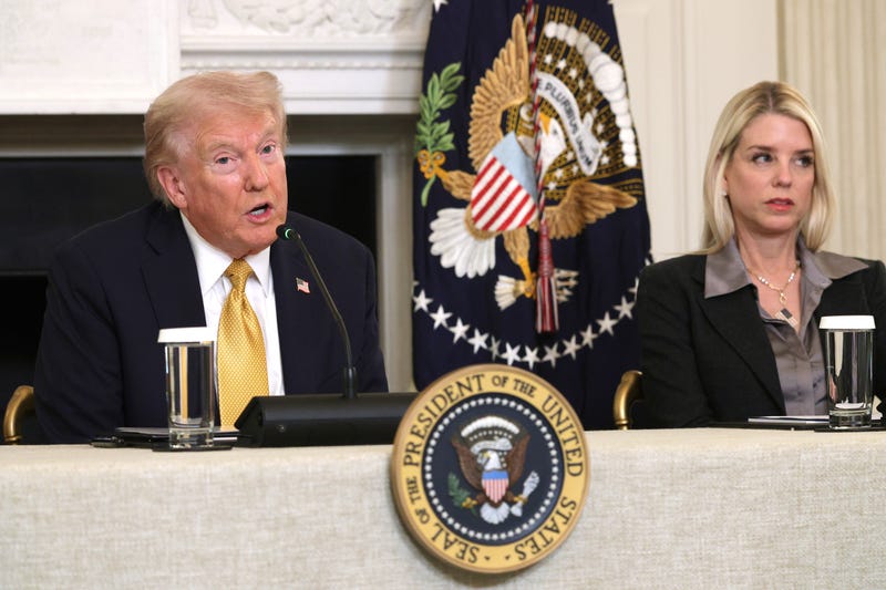 U.S. President Donald Trump and Attorney General Pam Bondi in the State Dining Room of the White House.