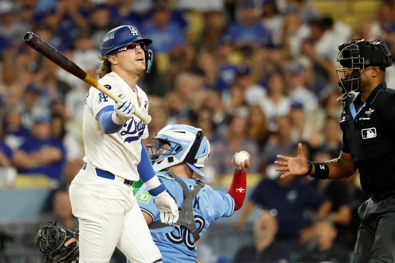Enrique Hernandez #8 of the Los Angeles Dodgers reacts after striking out during the eighth inning against the Toronto Blue Jays in game five of the 2025 World Series at Dodger Stadium on October 29, 2025 in Los Angeles, California.