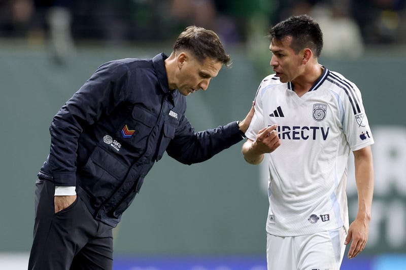 Head coach Mikey Varas of San Diego FC talks with Hirving Lozano #11 of San Diego FC during the 2025 MLS Cup Playoff match between San Diego FC and Portland Timbers at Providence Park on November 01, 2025 in Portland, Oregon