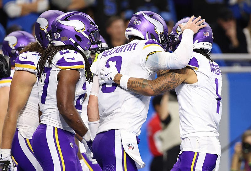 Jalen Nailor #1 of the Minnesota Vikings celebrates a touchdown with J.J. McCarthy #9 during the third quarter against the Detroit Lions in the game at Ford Field on November 02, 2025 in Detroit, Michigan. 