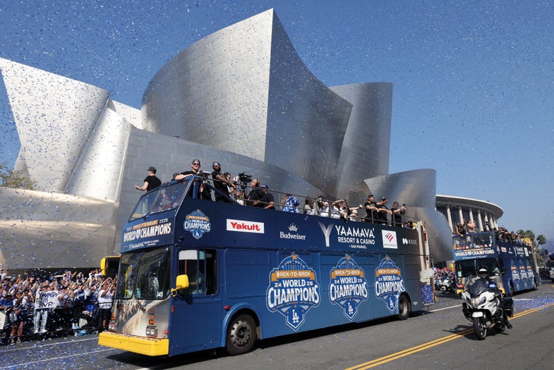 The Los Angeles Dodgers celebrate on a bus during the Dodgers 2025 World Series Championship parade on November 03, 2025 in Los Angeles, California.