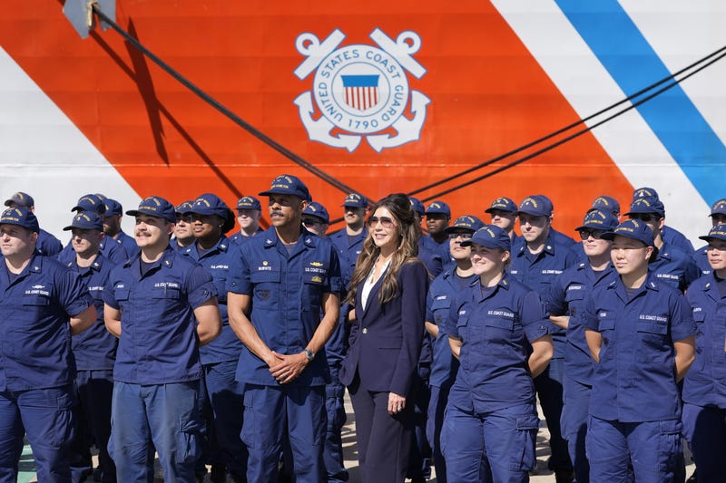 CHARLESTON, SC - NOVEMBER 07: U.S. Homeland Security Secretary Kristi Noem (C) poses for a group photo while touring the U.S. Coast Guard Station Charleston on November 7, 2025, in Charleston, South Carolina. 