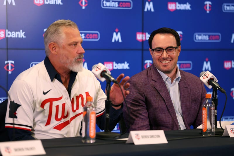 Manager Derek Shelton #8 of the Minnesota Twins addresses media as Vice President and Assistant General Manager Jeremy Zoll looks on during a press conference at Target Field on November 04, 2025 in Minneapolis, Minnesota. 