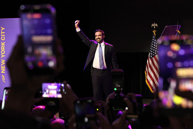 New York City Democratic mayoral candidate Zohran Mamdani celebrates as he takes the stage at his election night watch party at the Brooklyn Paramount on November 4, 2025 in the Brooklyn borough of New York City.