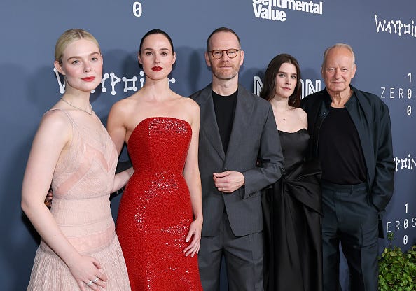 The cast and director of Sentimental Value pose on the red carpet at the movie's premiere.