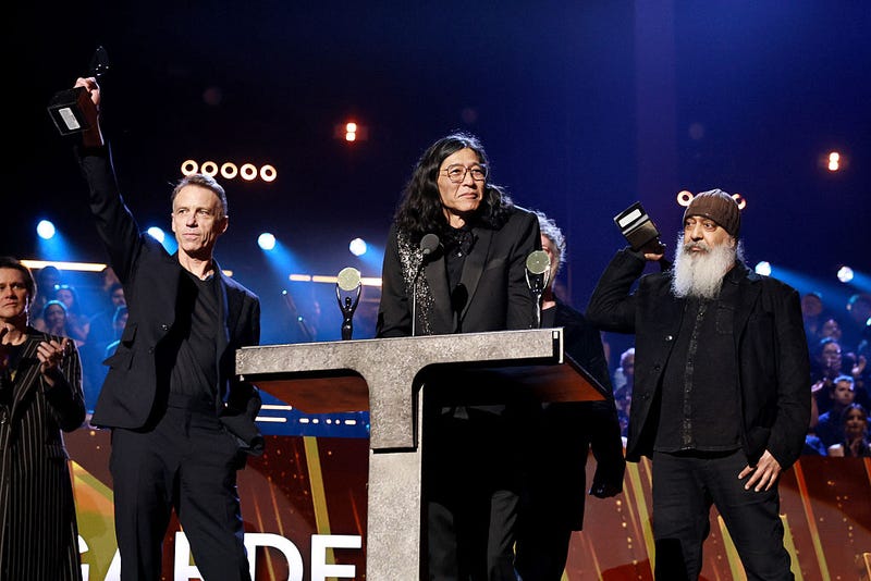 L-R) Inductees Matt Cameron, Hiro Yamamoto and Kim Thayil of Soundgarden speak onstage during the 2025 Rock & Roll Hall of Fame Induction Ceremony at Peacock Theater on November 08, 2025 in Los Angeles, California.