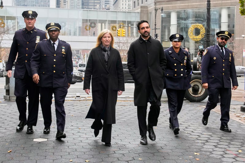 Mayor-elect Zohran Mamdani, center, right, and NYPD Commissioner Jessica Tisch, center left, walk to the New York City Police Memorial, on Nov. 19, 2025