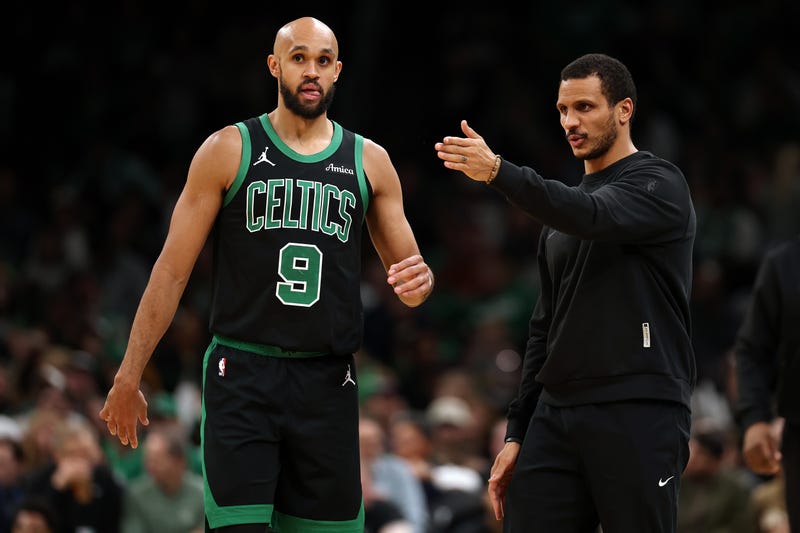 : Derrick White #9 of the Boston Celtics talks with head coach Joe Mazzulla during the second half against the LA Clippers at TD Garden on November 16, 2025 in Boston, Massachusetts. The Celtics defeat the Clippers 121-118.
