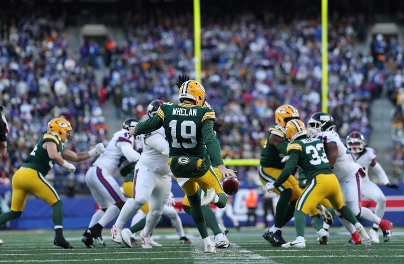 Daniel Whelan #19 of the Green Bay Packers punts against the New York Giants at MetLife Stadium on November 16, 2025 in East Rutherford, New Jersey.