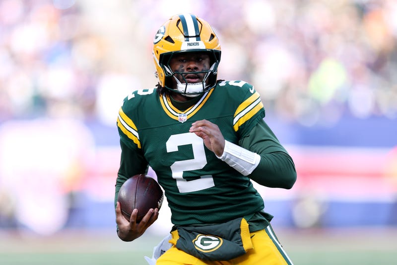 Malik Willis #2 of the Green Bay Packers runs with the ball during the first half against the New York Giants at MetLife Stadium on November 16, 2025 in East Rutherford, New Jersey