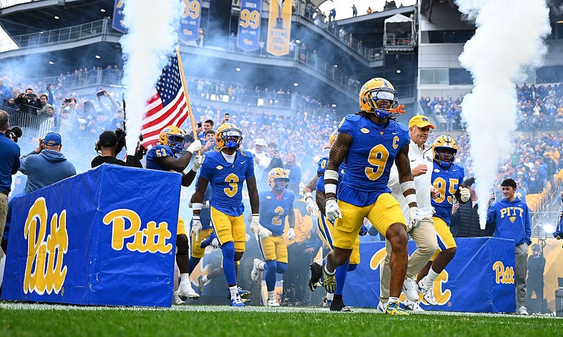 Kyle Louis running onto the field at Acrisure Stadium