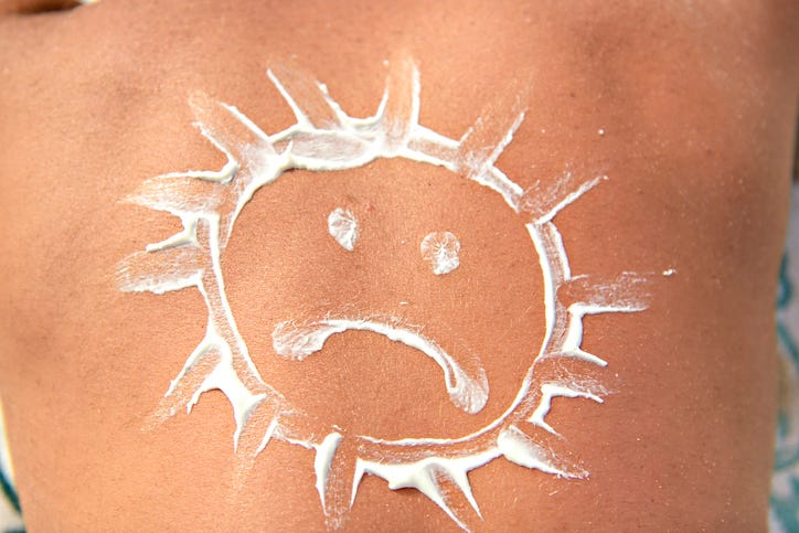 Man with ungry sun on his back