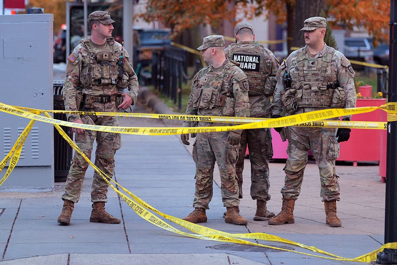 National Guard soldiers respond to a shooting near the White House on November 26, 2025 in Washington, DC. At least two National Guardsmen have been shot blocks from the White House.