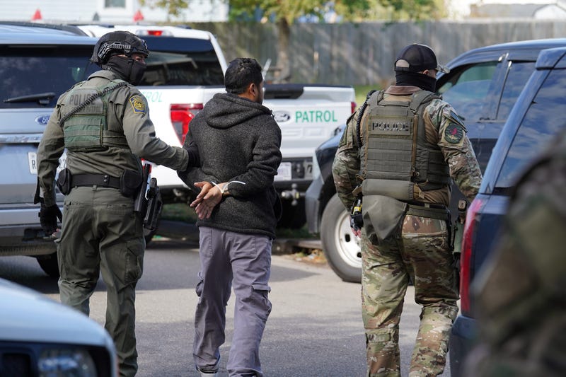 NEW ORLEANS, LOUISIANA - DECEMBER 3: U.S. Border Patrol agents detain a man on the street on December 3, 2025 in New Orleans, Louisiana. This comes on the first day of the operation in Louisiana, 'Catahoula Crunch,' launched by the Department of Homeland Security as a part of the immigration enforcement surge on undocumented immigrants in the United States.