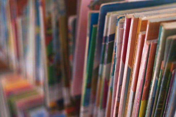 Stacked Books on a Home Bookshelf