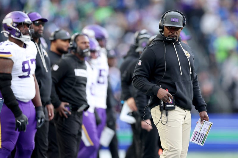Defensive coordinator Brian Flores of Minnesota Vikings looks on against the Seattle Seahawks at Lumen Field on November 30, 2025 in Seattle, Washington. 
