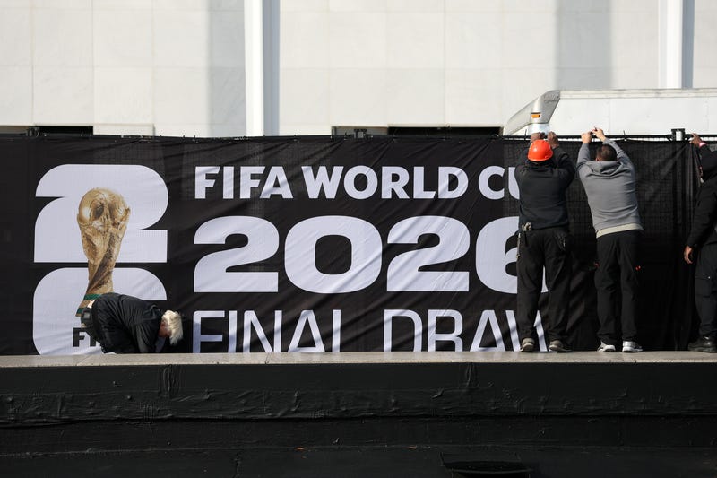 WASHINGTON, DC - DECEMBER 04: Final preparations are made as FIFA World Cup 2026 Final Draw signage is displayed outside the Kennedy Center on December 04, 2025 in Washington, DC. (Photo by Dan Mullan/Getty Images)