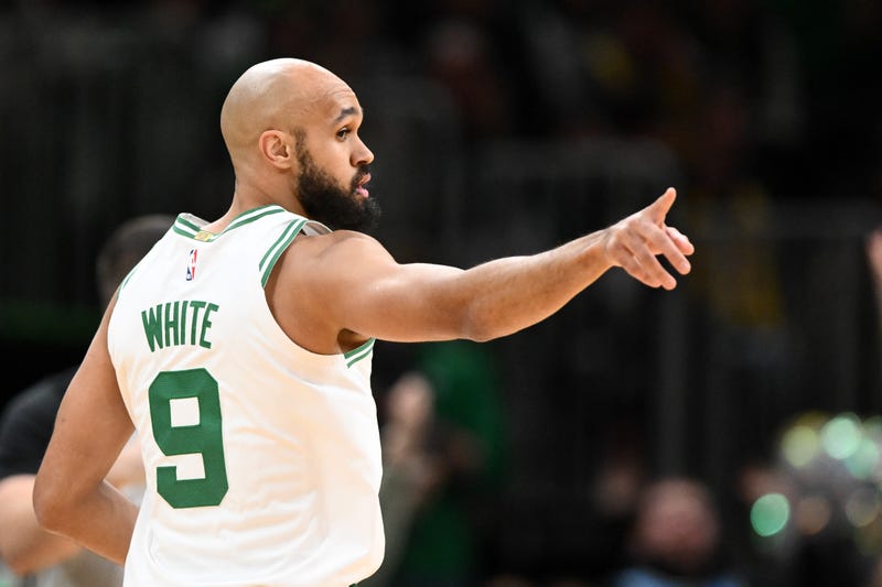 Derrick White #9 of the Boston Celtics reacts after making a basket against the Los Angeles Lakers during the first half at the TD Garden on December 05, 2025 in Boston, Massachusetts.