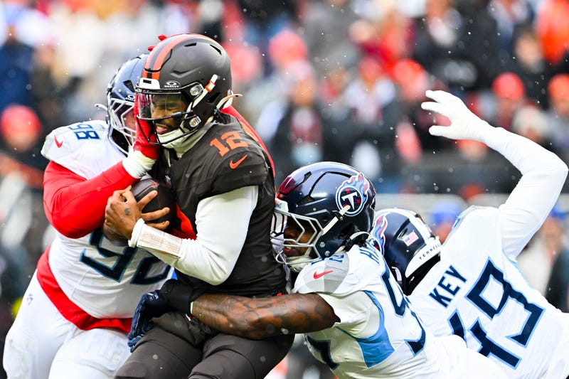 CLEVELAND, OHIO - DECEMBER 07: Jeffery Simmons #98 of the Tennessee Titans sacks Shedeur Sanders #12 of the Cleveland Browns during the first quarter at Huntington Bank Field on December 07, 2025 in Cleveland, Ohio. (Photo by Jason Miller/Getty Images)