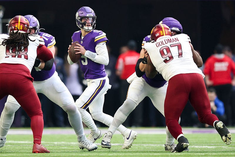 J.J. McCarthy #9 of the Minnesota Vikings throws a pass during the second quarter against the Washington Commanders at U.S. Bank Stadium on December 07, 2025 in Minneapolis, Minnesota. 