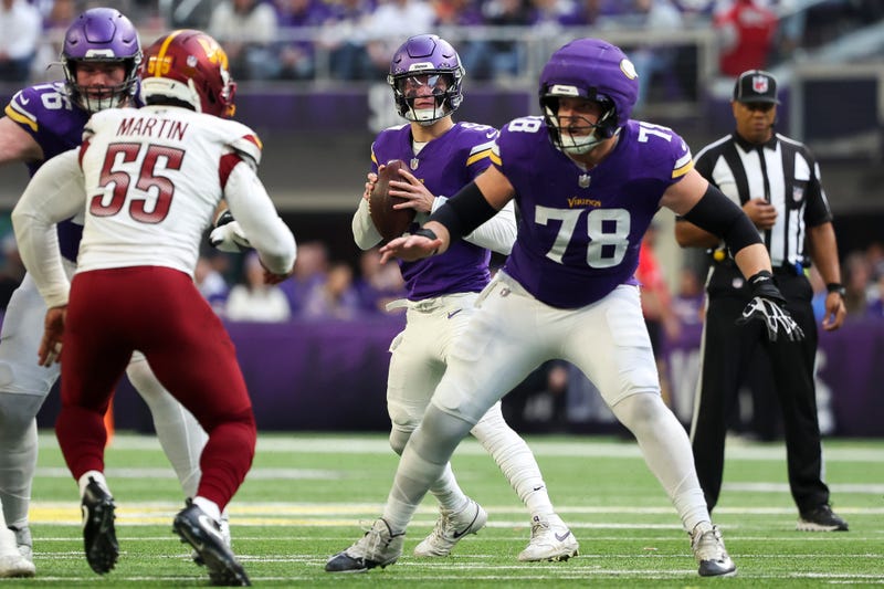 J.J. McCarthy #9 of the Minnesota Vikings looks to pass during the second quarter against the Washington Commanders at U.S. Bank Stadium on December 07, 2025 in Minneapolis, Minnesota. 