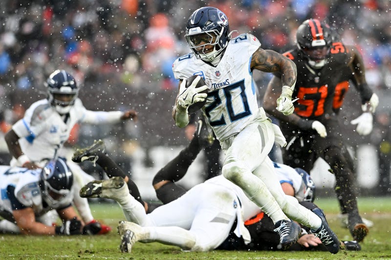CLEVELAND, OHIO - DECEMBER 07: Tony Pollard #20 of the Tennessee Titans runs for a touchdown during the third quarter against the Cleveland Browns at Huntington Bank Field on December 07, 2025 in Cleveland, Ohio. (Photo by Nick Cammett/Getty Images)