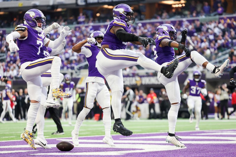 The Minnesota Vikings celebrate during the fourth quarter against the Washington Commanders at U.S. Bank Stadium on December 07, 2025 in Minneapolis, Minnesota. 