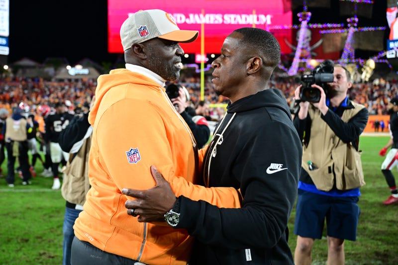 TAMPA, FLORIDA - DECEMBER 11: Head coach Todd Bowles of the Tampa Bay Buccaneers and head coach Raheem Morris of the Atlanta Falcons meet after the Falcons beat the Buccaneers 29-28 at Raymond James Stadium on December 11, 2025 in Tampa, Florida.