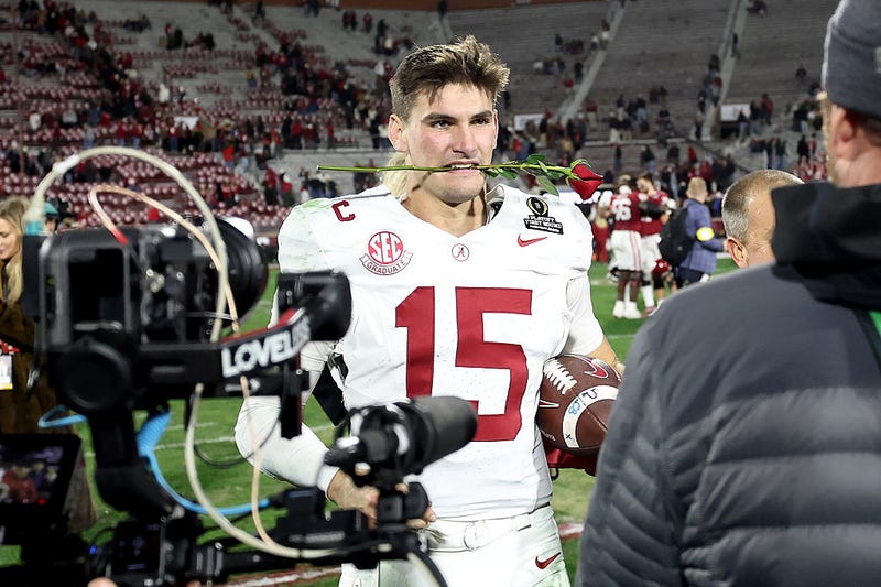 Ty Simpson #15 of the Alabama Crimson Tide celebrates after defeating the Oklahoma Sooners during 2025 College Football Playoff First Round Game at Gaylord Family Oklahoma Memorial Stadium on December 19, 2025 in Norman, Oklahoma.