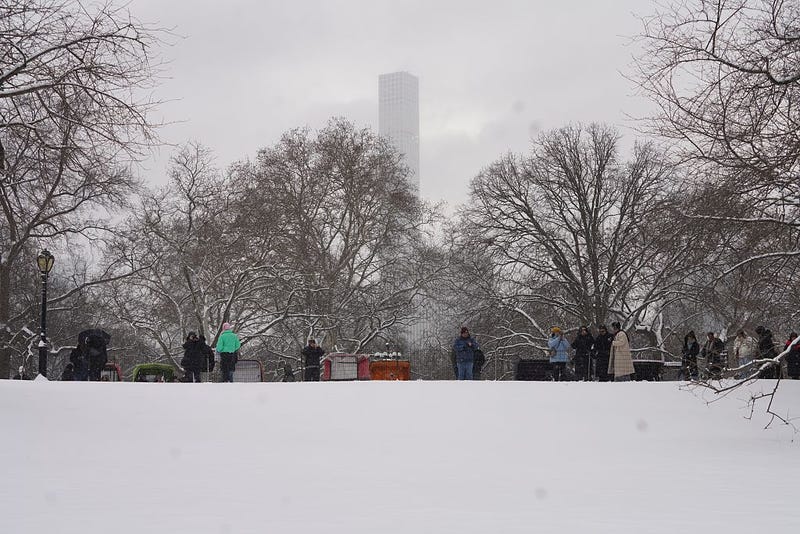 People visit the snow-covered Central Park in New York, the United States, on Dec. 27, 2025.