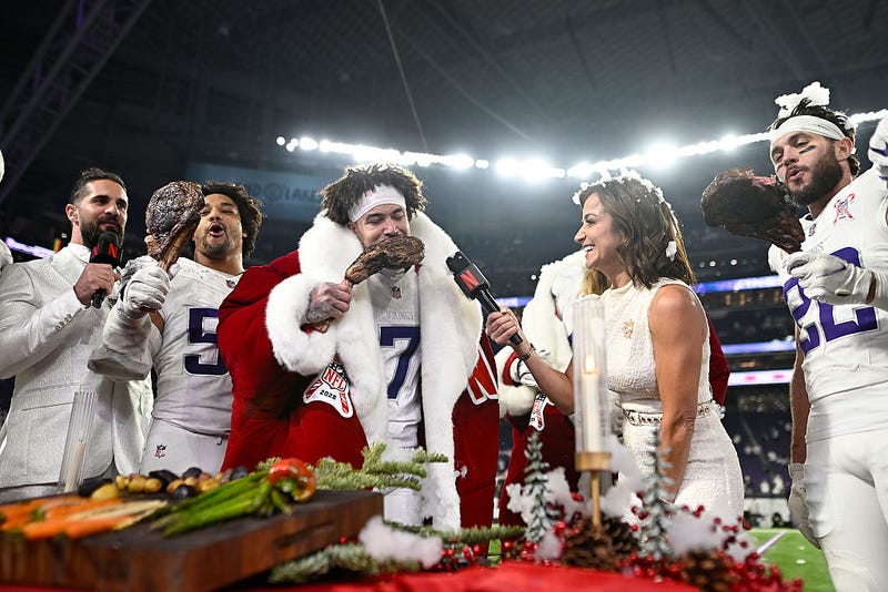 Byron Murphy Jr. #7 of the Minnesota Vikings and his teammates are interviewed following the team's 23-10 win against the Detroit Lions at U.S. Bank Stadium on December 25, 2025 in Minneapolis, Minnesota. 