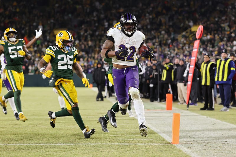 Derrick Henry #22 of the Baltimore Ravens scores a touchdown in the fourth quarter against the Green Bay Packers at Lambeau Field on December 27, 2025 in Green Bay, Wisconsin. 