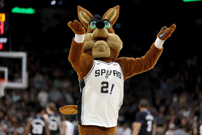 The Coyote of the San Antonio Spurs performs during the game against the Utah Jazz at Frost Bank Center on December 27, 2025 in San Antonio, Texas