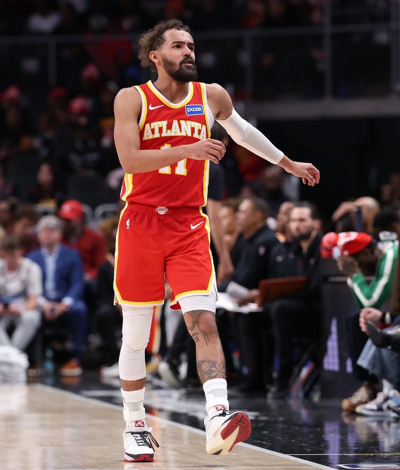 ATLANTA, GEORGIA - DECEMBER 23: Trae Young #11 of the Atlanta Hawks reacts against the Chicago Bulls during the fourth quarter at State Farm Arena on December 23, 2025 in Atlanta, Georgia. 