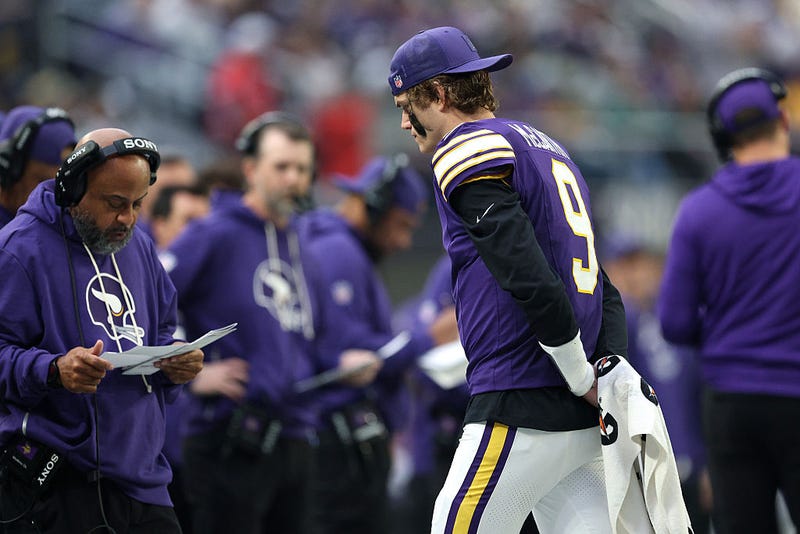 J.J. McCarthy #9 of the Minnesota Vikings looks on during the third quarter against the Green Bay Packers at U.S. Bank Stadium on January 04, 2026 in Minneapolis, Minnesota.
