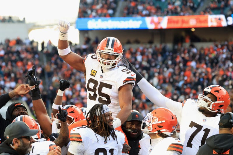 Myles Garrett #95 of the Cleveland Browns celebrates after breaking the NFL single-season sack record during the game against the Cincinnati Bengals at Paycor Stadium on January 04, 2026 in Cincinnati, Ohio. 