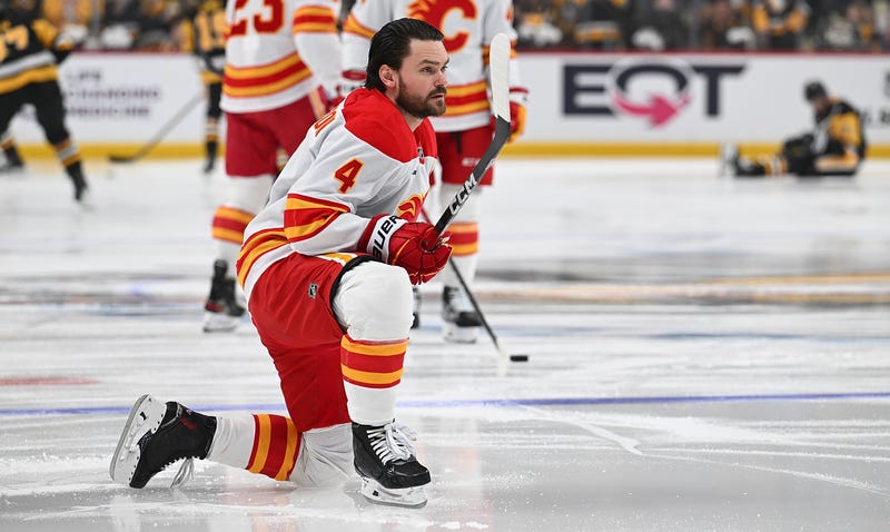 Rasmus Andersson #4 of the Calgary Flames looks on during warmups before a game against the Pittsburgh Penguins at PPG PAINTS Arena on January 10, 2026 in Pittsburgh, Pennsylvania.