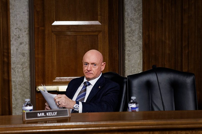 Senator Mark Kelly (D-AZ) takes his seat during a Senate Armed Services Committee Confirmation Hearing on Capitol Hill on January 15, 2026 in Washington, DC.