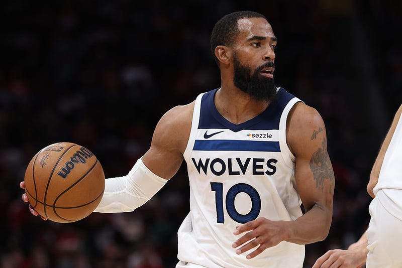 Mike Conley #10 of the Minnesota Timberwolves in action during the game against the Houston Rockets at Toyota Center on January 16, 2026 in Houston, Texas.  